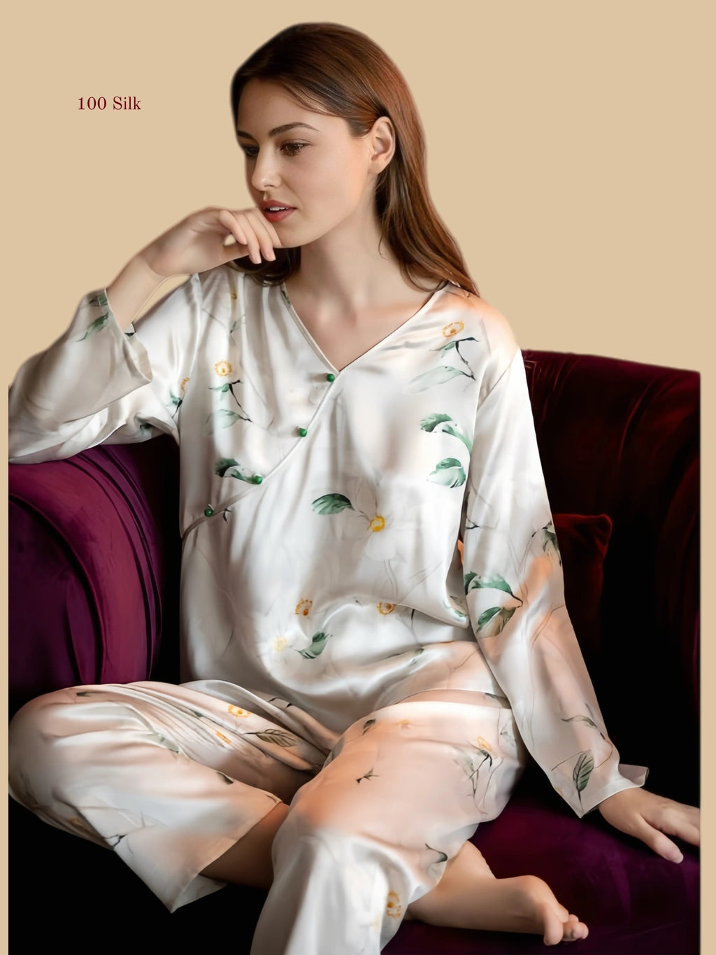 Champagne Apricot 19mm floral silk set seated view with botanical print and loose long-sleeve top