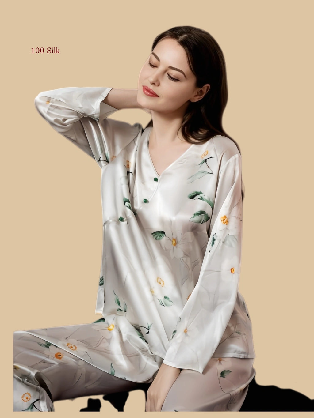 Champagne Apricot 19mm floral silk set seated view with botanical print and loose long-sleeve top