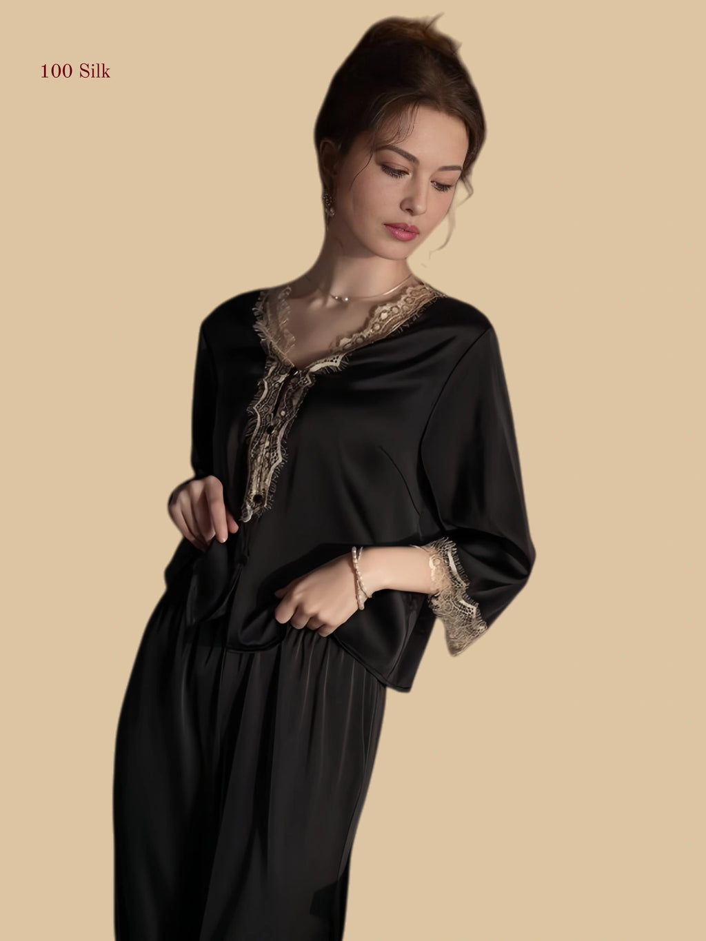 black 19mm lace-placket silk set front view with lace V neck and relaxed trousers