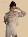 off-white 19mm lace-placket silk set front view with lace V neck and relaxed trousers