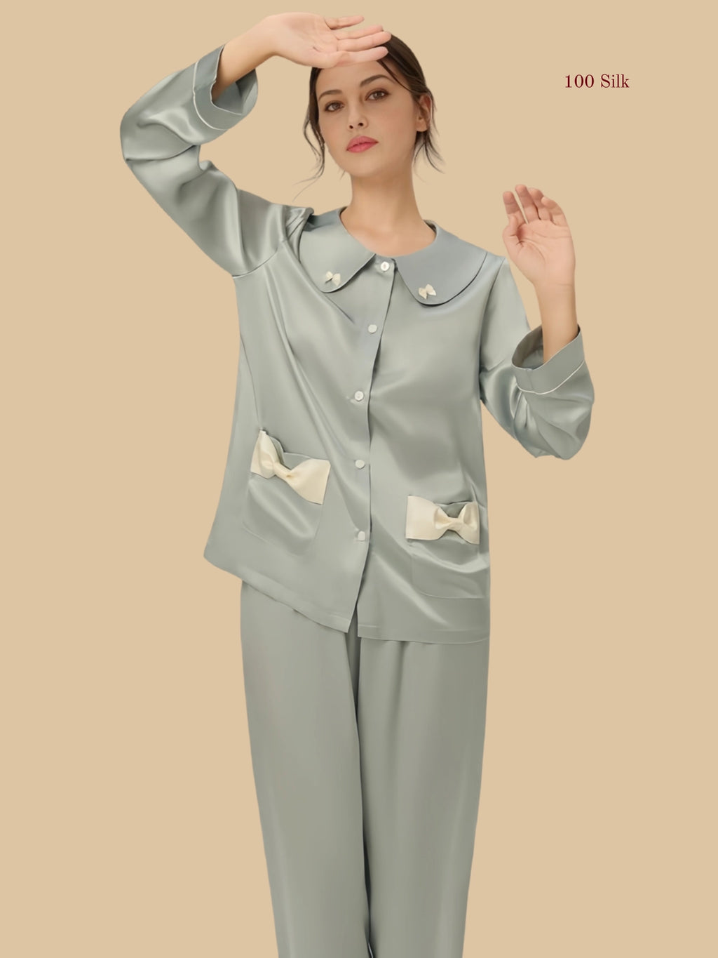 Sky blue 19mm Peter Pan silk set front view with oversized collar and contrast bow pocket detai