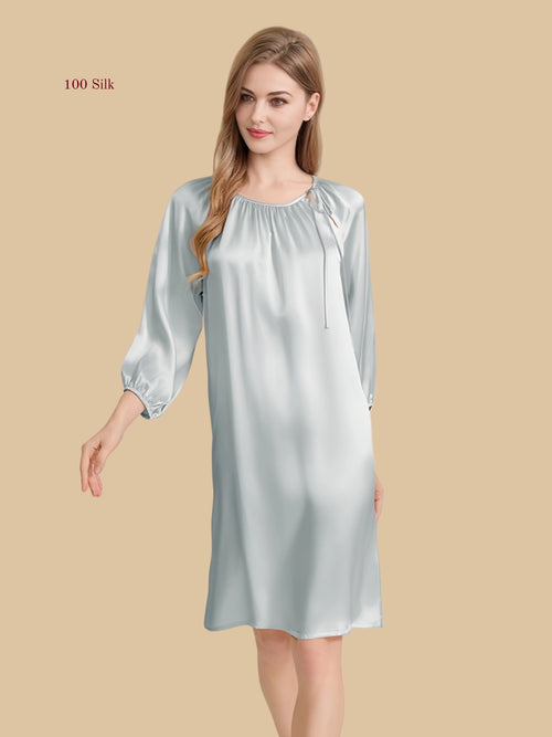 Light blue 16mm silk lounge dress front view with gathered neckline and shoulder tie