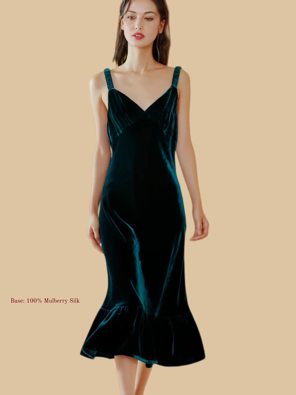 Green velvet midi dress front view with clean body-skimming silhouette and ruffled hem