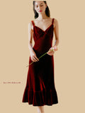 Maple leaf red velvet midi dress front view with gathered V neck and fishtail hem