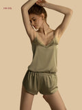 Matcha green 19mm silk cami short set front view with lace-trim neckline and elastic-waist shorts