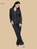 Black 19mm moon print pajama set front view with contrast piping and full-length pants
