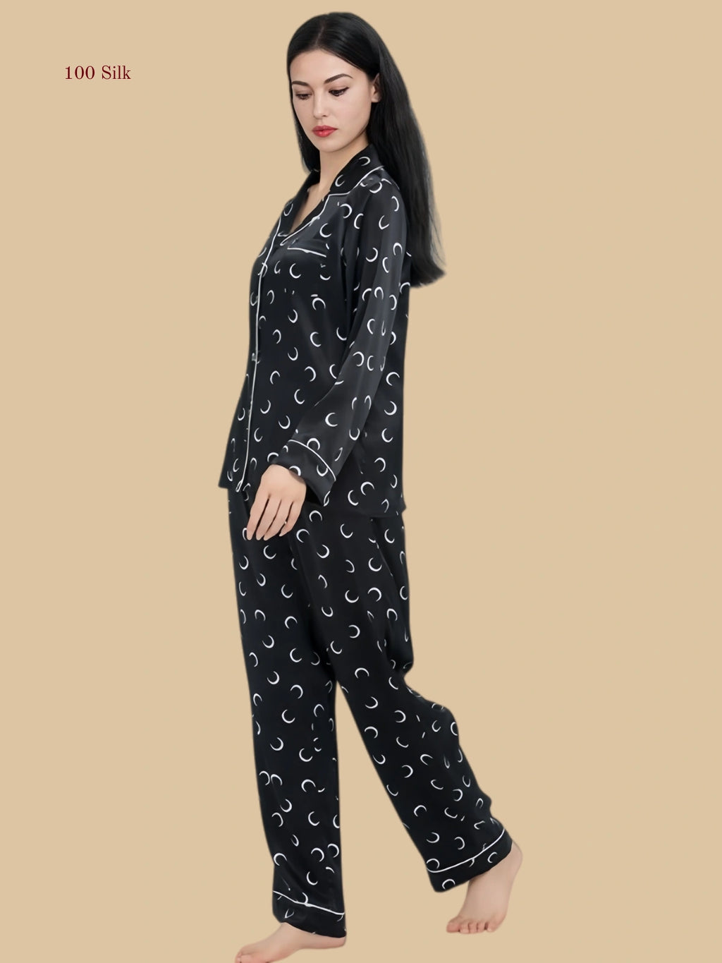 Black 19mm moon print pajama set side view with notched collar and piped cuffs