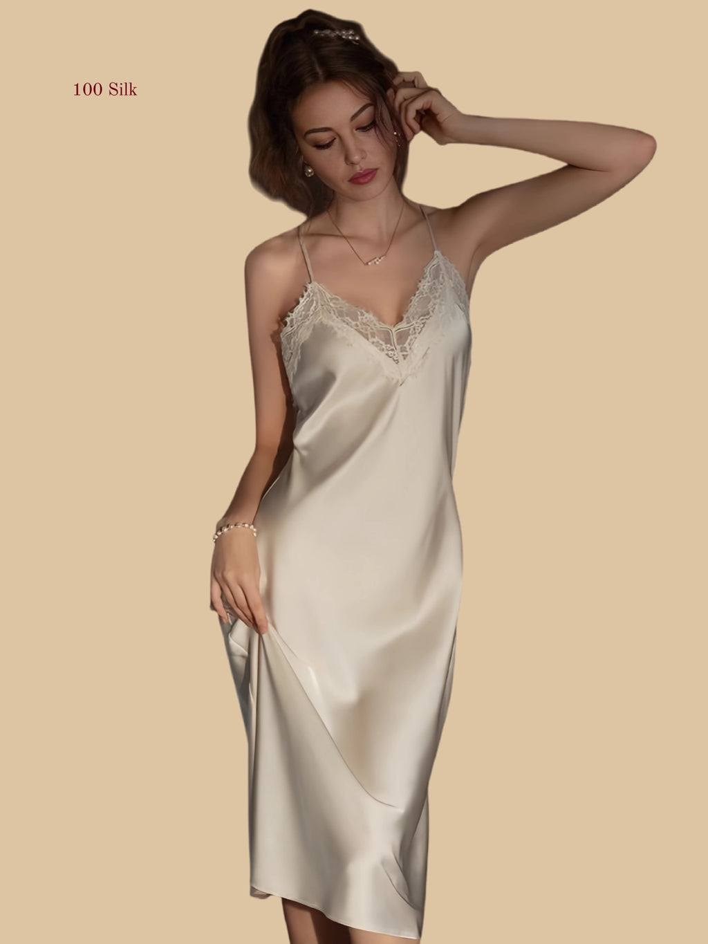 Front view of 19mm silk midi nightdress with lace V-neck and cross-back design in Off-white