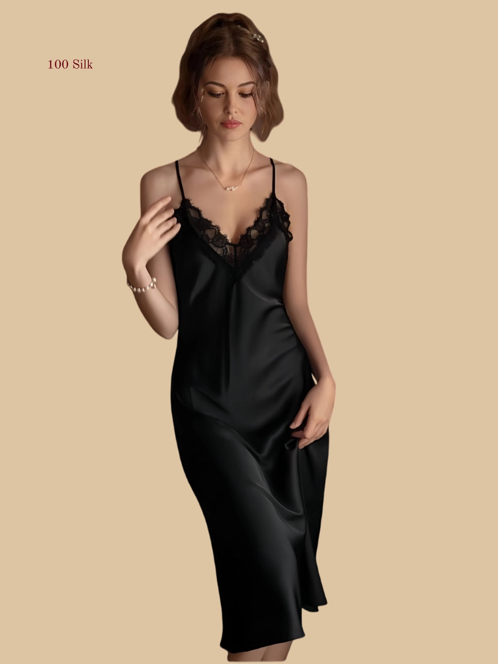 Front view of 19mm silk midi nightdress with lace V-neck and cross-back design in black