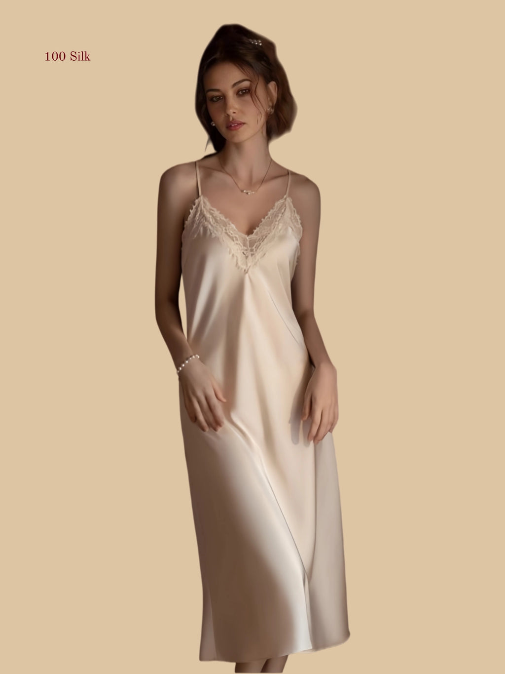Front view of 19mm silk midi nightdress with lace V-neck and cross-back design in Champagne