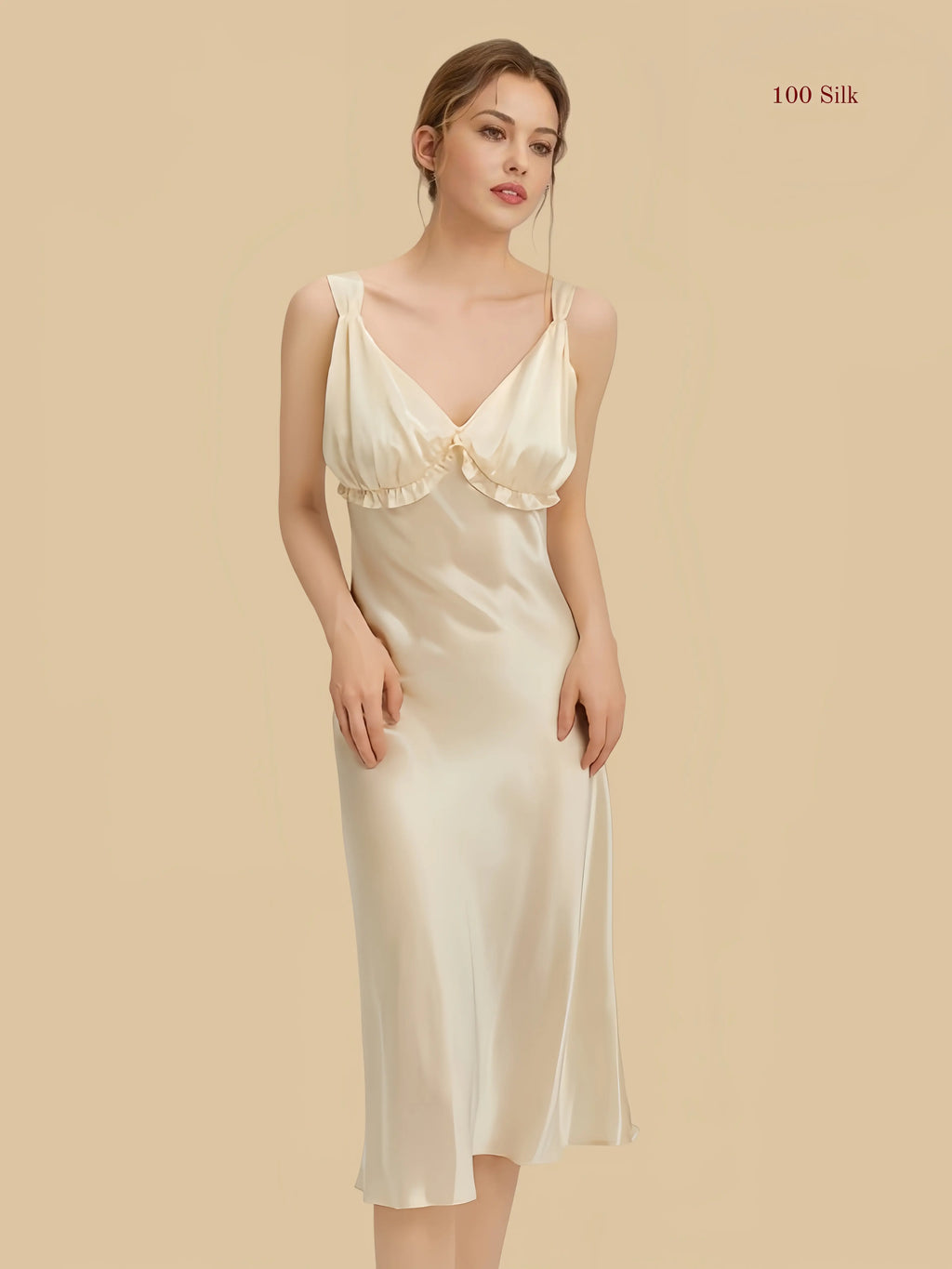 Champagne 16.5mm silk slip front view with ruffle bust and center tie