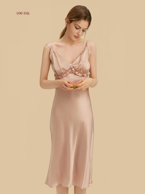 Coral pink 16.5mm silk slip front view with soft ruffle bust detail