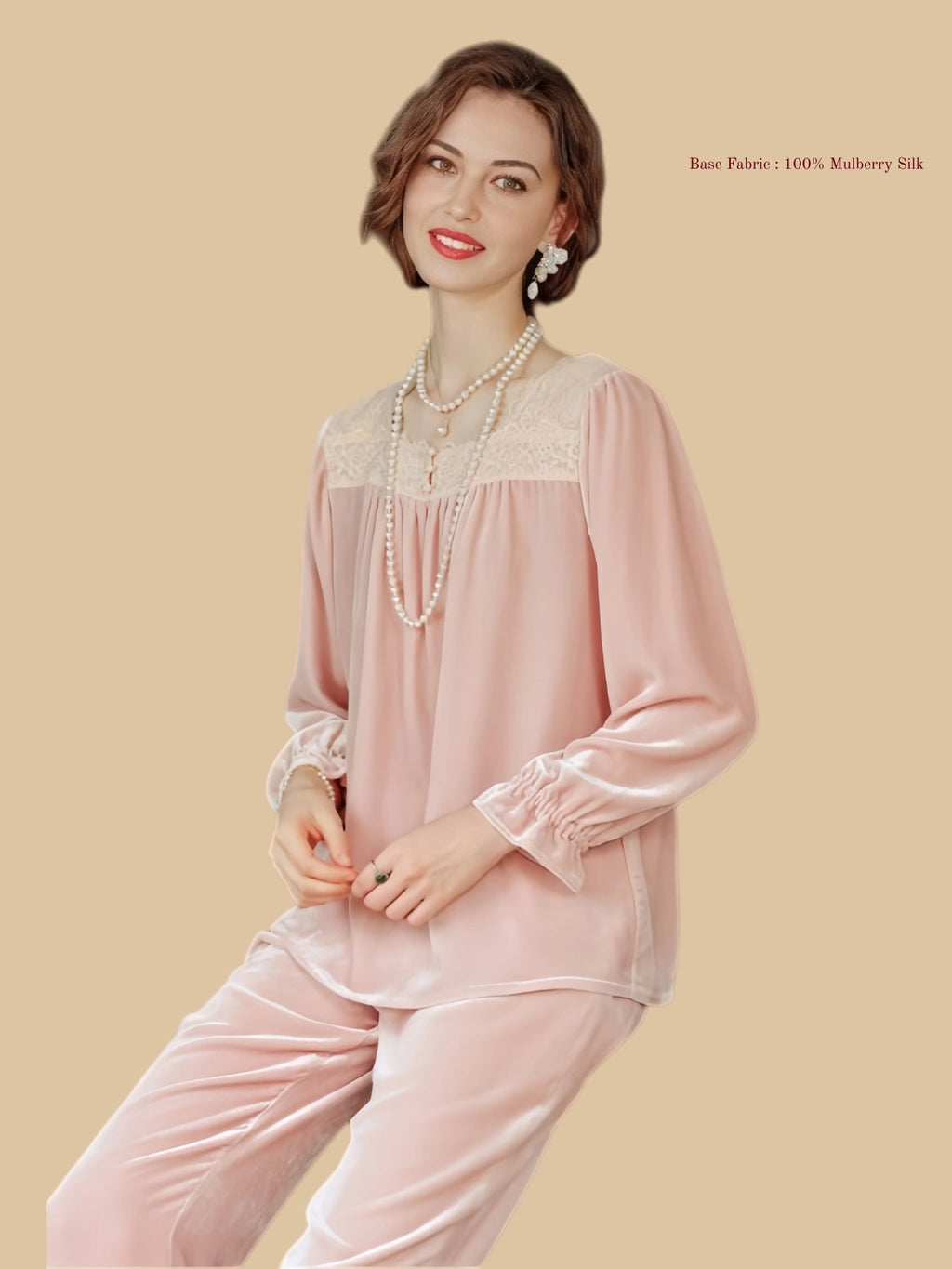 Pink heavyweight velvet blouse set seated view with loose blouse top and soft velvet trousers