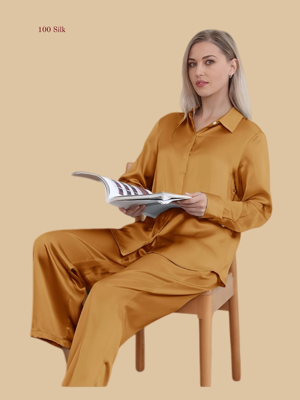 orange 19mm minimal pajama set seated view with smooth shirt-style top and straight pants