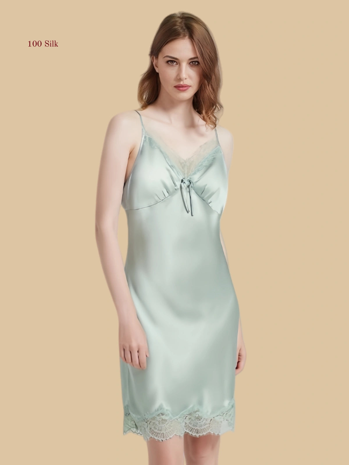 Green 19mm silk slip dress front view with wide lace neckline and center tie