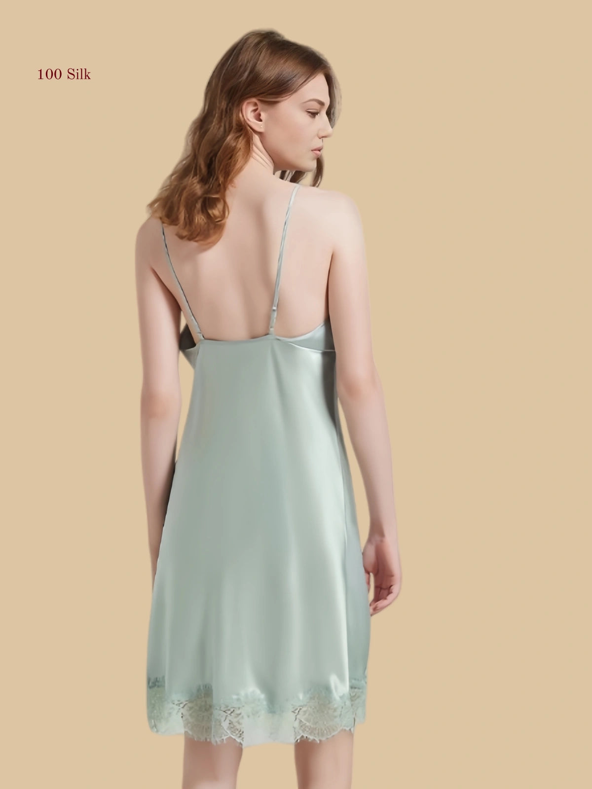 Green 19mm silk slip dress back view with adjustable straps and soft open back