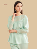 Mint green 19mm lace-yoke capri pajamas front view with sheer upper yoke and cropped pants