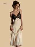 Front view of 19mm silk slip dress with black lace bodice and midi lengtha