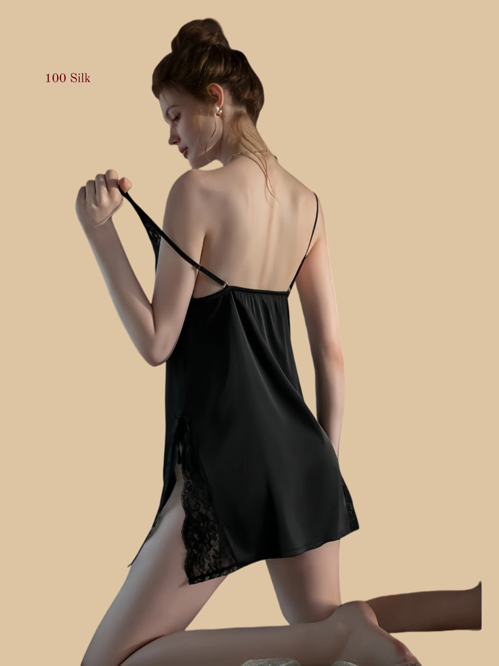 Side view of silk slip dress with lace panel detail and slit