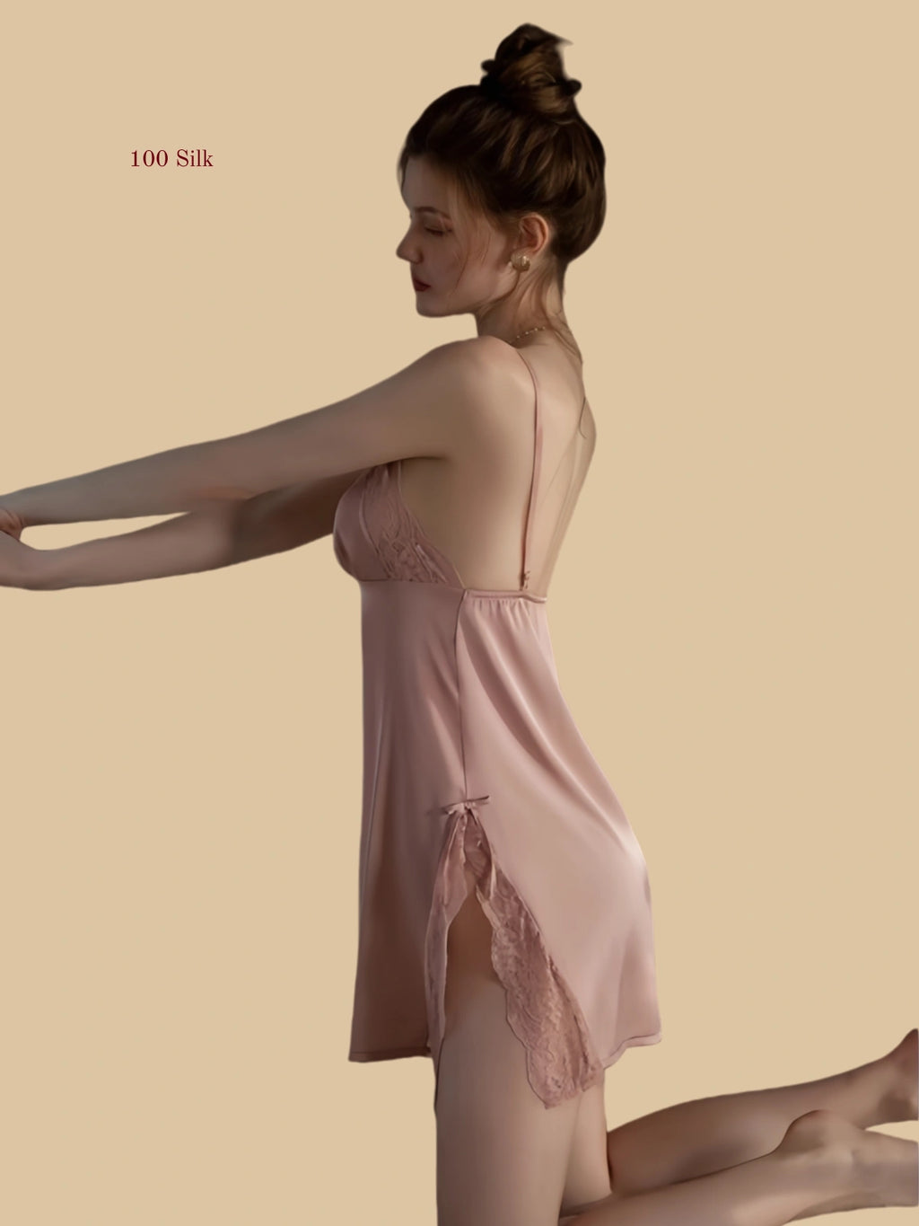 Side view of silk slip dress with lace panel detail and slit