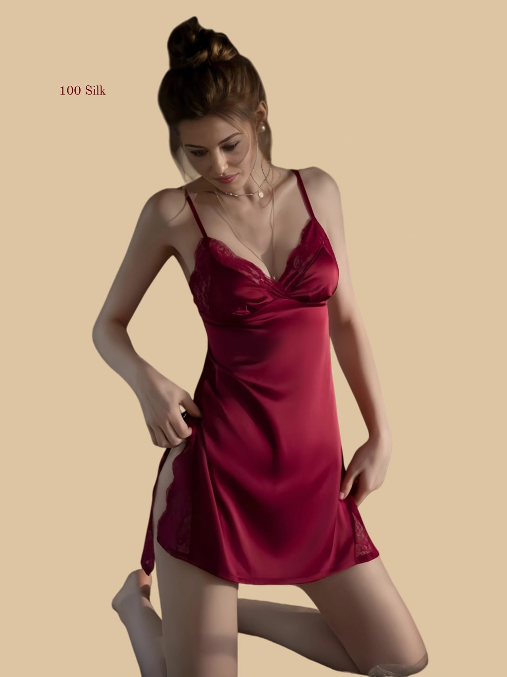 Front view of 19mm silk slip dress with lace panel and side slit in red.