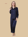 Dark blue 16mm cropped pajamas front view with contrast-piped collar and chest welt pocket