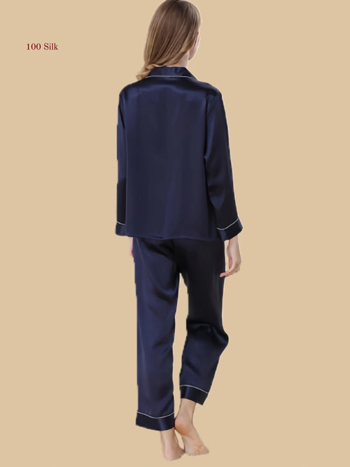 dark blue 16mm cropped pajamas back view with piped cuffs and cropped straight-leg pants