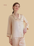 Champagne beige 19mm piped collar pajamas front view with contrast welt pocket and button-front shirt