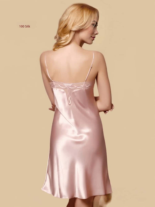 Detailed view of the T-shaped lace mesh back and adjustable straps on a Silkgala silk nightgown.