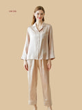 Soft beige 19mm silk pajama set front view with contrast-piped notch collar and wide cuff bands