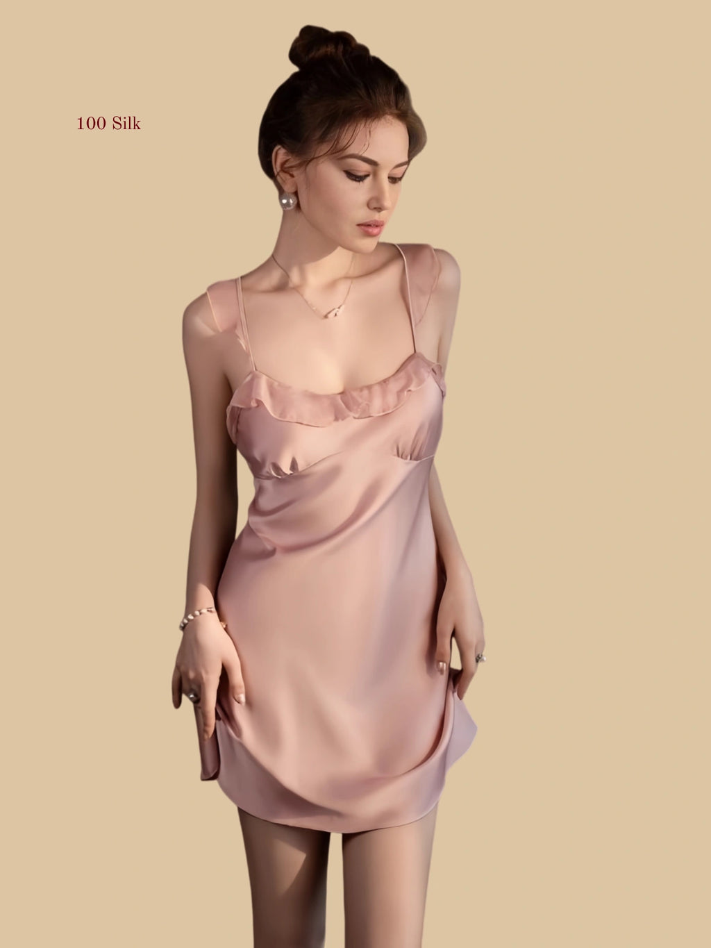 Front view of 19mm silk mini slip dress with ruffle neckline in Pink