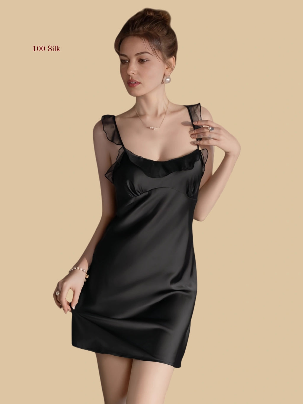 Front view of 19mm silk mini slip dress with ruffle neckline in Black