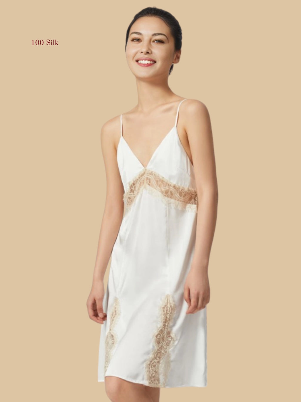 Front view of a white 19mm mulberry silk nightgown with exquisite eyelash lace detailing on the bust and hem.