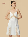 Front view of a white 19mm mulberry silk nightgown with exquisite eyelash lace detailing on the bust and hem.