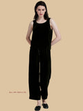 Dark green velvet vest and pants set front view with sleeveless top and drawstring trousers
