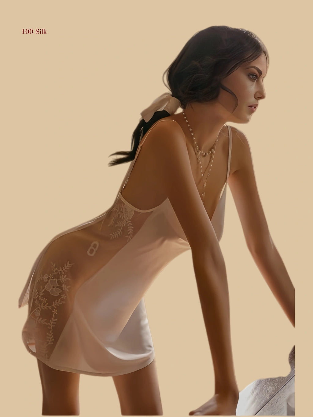 White 19mm silk slip side view with transparent floral embroidery panel and mini silhouette