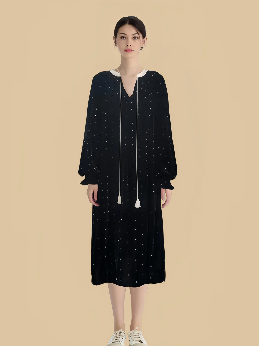 Black tassel-tie velvet dress front view with scattered star print and long neckline ties