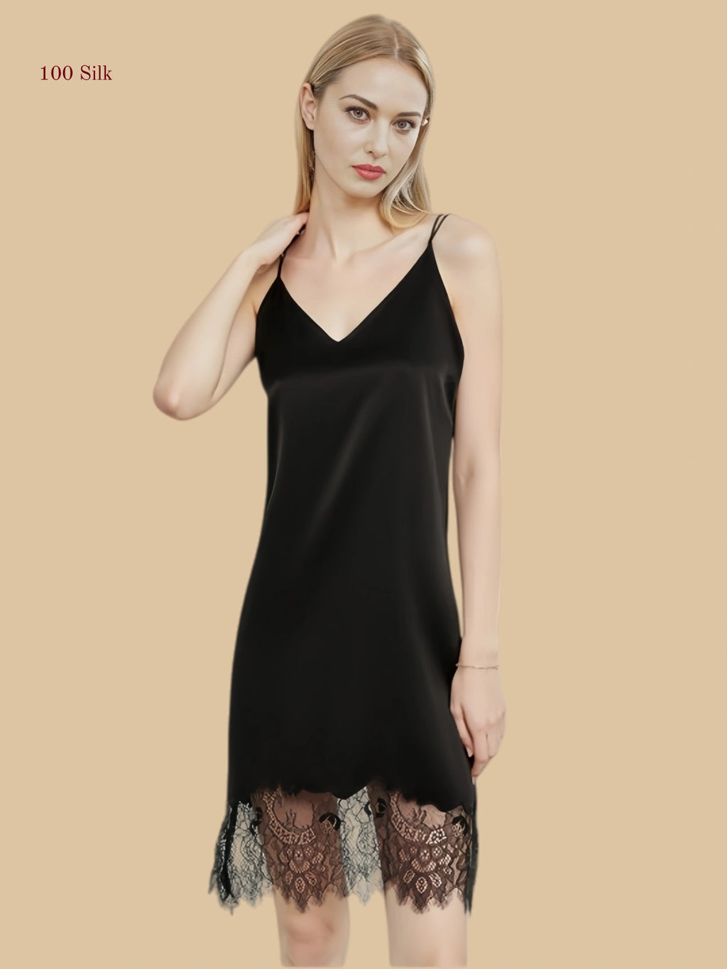 Onyx Black 100% mulberry silk V-neck nightgown with intricate peacock feather lace patchwork at the hem.