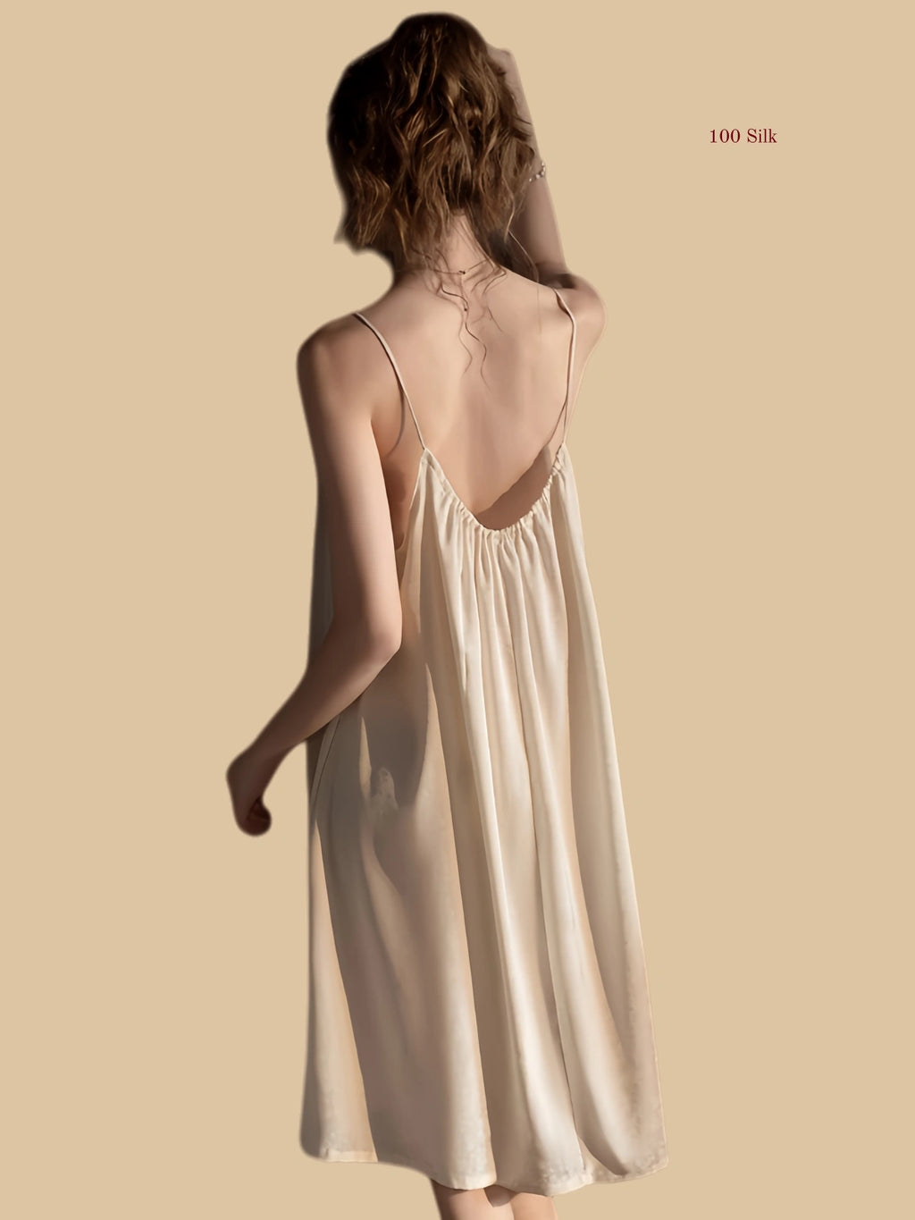 Back view of silk nightgown with low gathered back and flowing silhouette