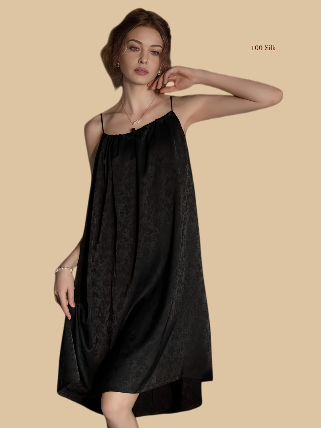 Front view of 19mm black silk gathered nightdress with spaghetti straps