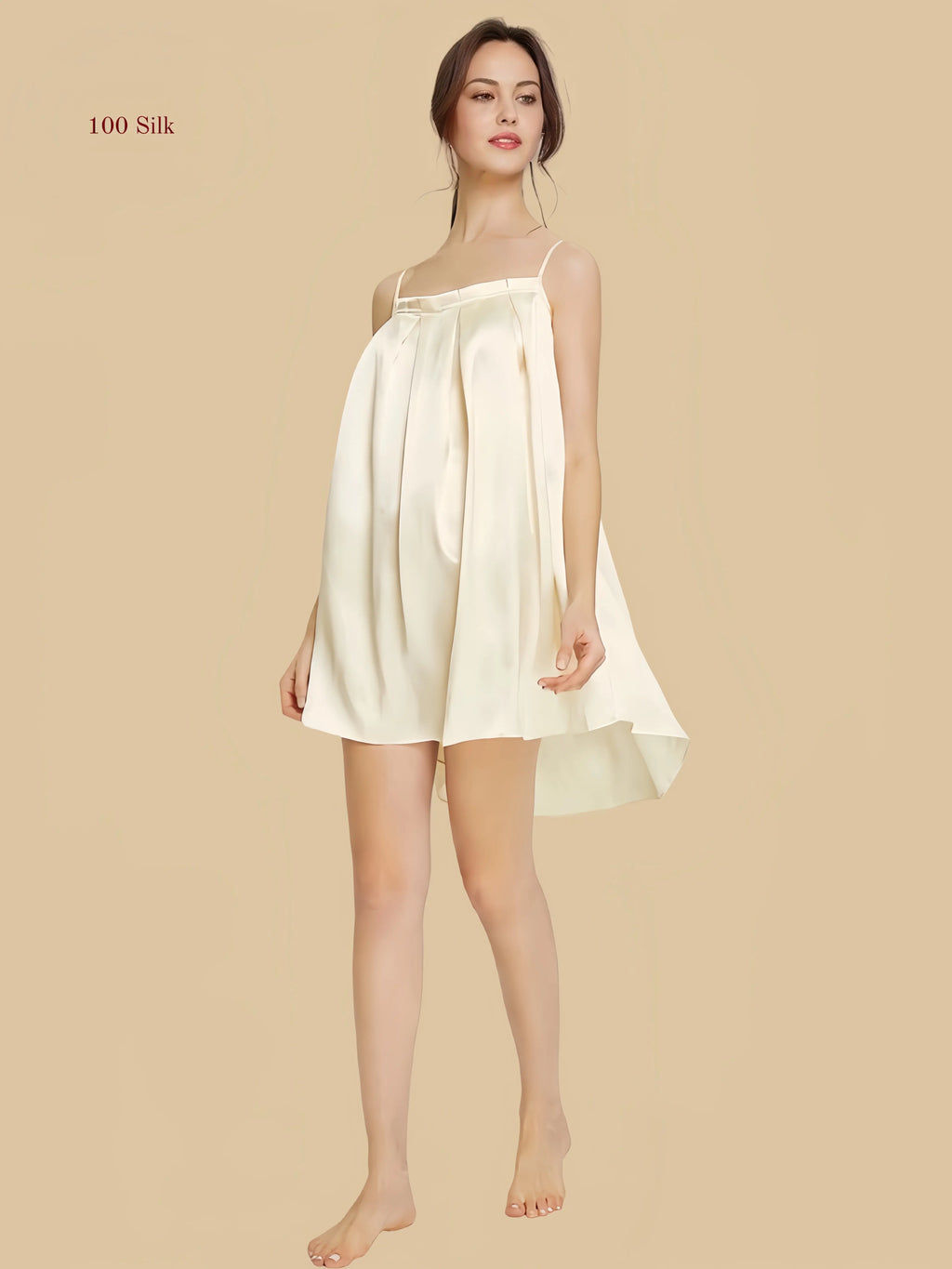 Front view of a 16mm apricot mulberry silk babydoll nightgown with delicate pleating and a loose A-line silhouette.