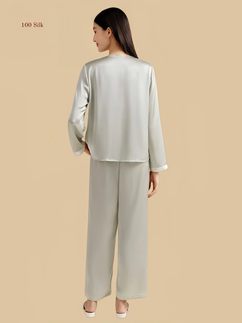 Light bean green 19mm contrast-collar silk set back view with long sleeves and straight pants