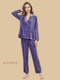 Purple velvet tailored set front view with patch pockets and full-length trousers