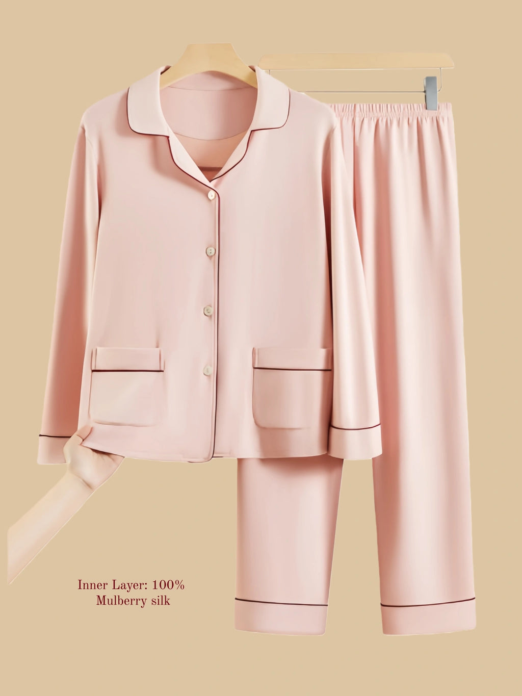 Soft pink dual-layer thermal set flat lay with button-front top and straight-leg pants