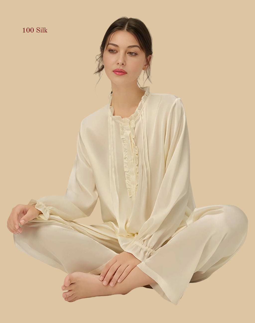 Off-white 19mm stand collar silk set seated view with gathered cuffs and relaxed full-length pants