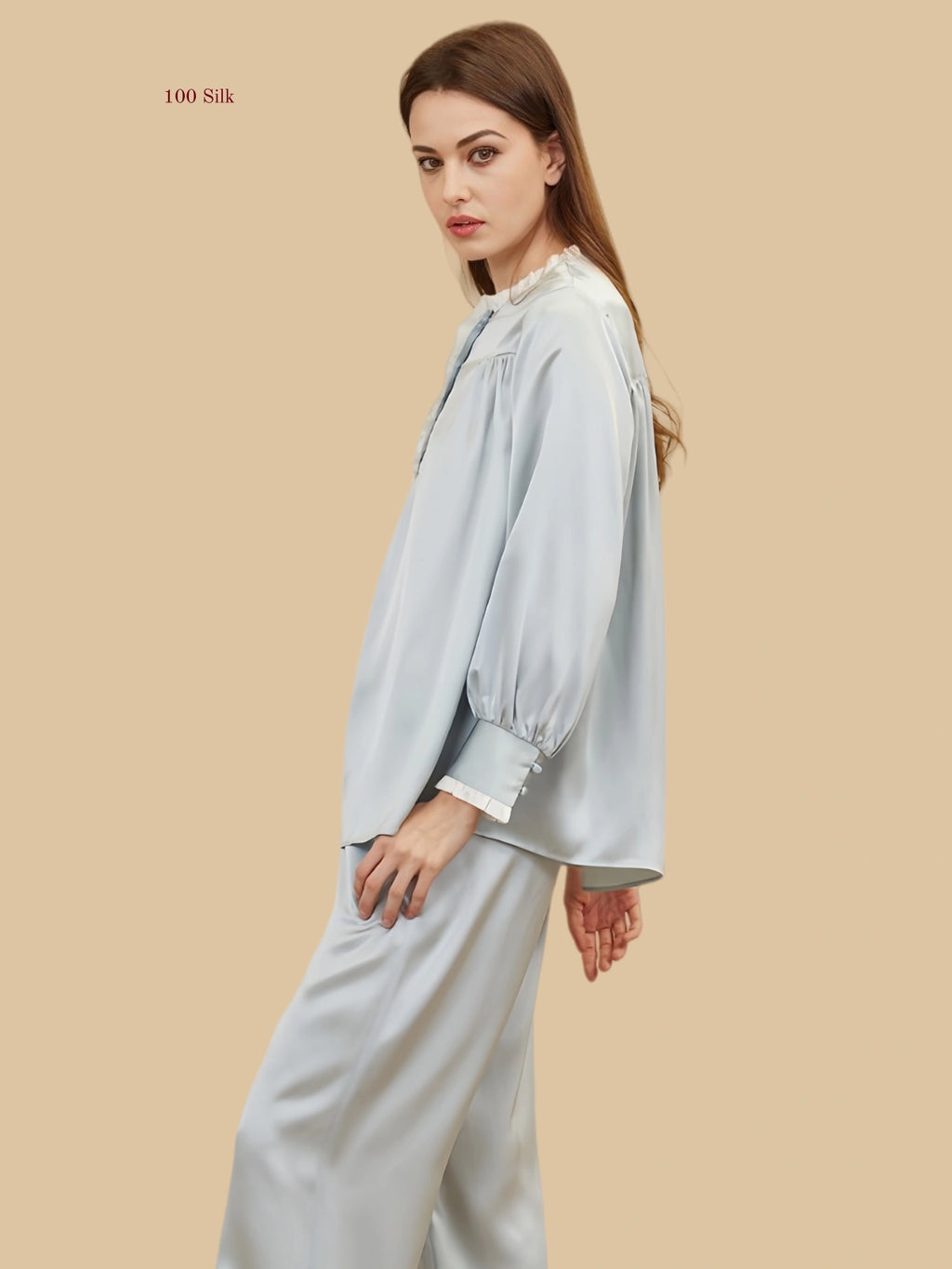 Mint green 19mm lantern-sleeve silk set side view with gathered sleeves and soft stand collar