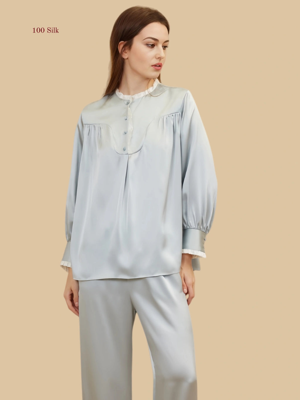 Mint green 19mm lantern-sleeve silk set front view with pleated front yoke and frill-trim cuffs