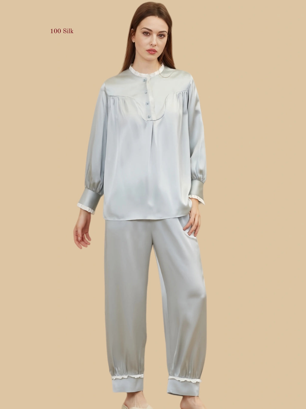 Mint green 19mm lantern-sleeve silk set front view with pleated front yoke and frill-trim cuffs