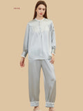 Mint green 19mm lantern-sleeve silk set front view with pleated front yoke and frill-trim cuffs