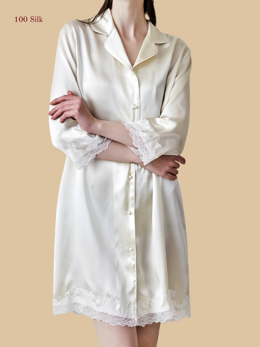 Close-up of the premium white lace contrast and buttons on a short silk nightgown.